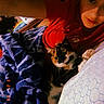 Patricia joined the competition — help win amazing prizes! bed, blanket, calico_cat, casual, cat, closeup, comfort, cozy, cuddling, feline, indoor, pattern, person, pillow, red_shirt, resting, selfie, shadow, vintage, warm_lighting