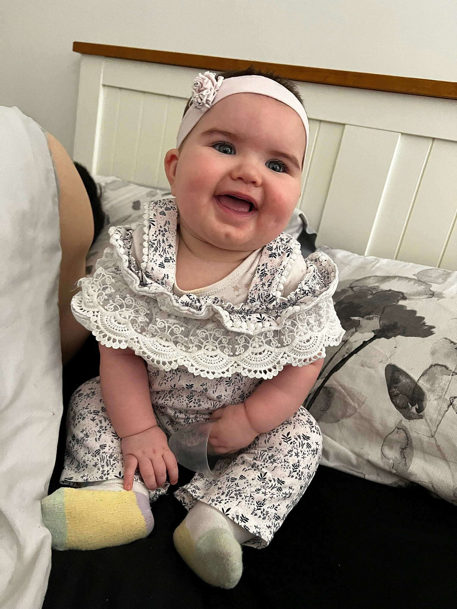 Delilah joined the competition — help win amazing prizes! baby, baby_toddler_clothing, child, event, eye, face, fashion_accessory, flooring, gesture, happy, headband, headpiece, headwear, human_body, jewellery, joy, pattern, person, sitting, sleeve