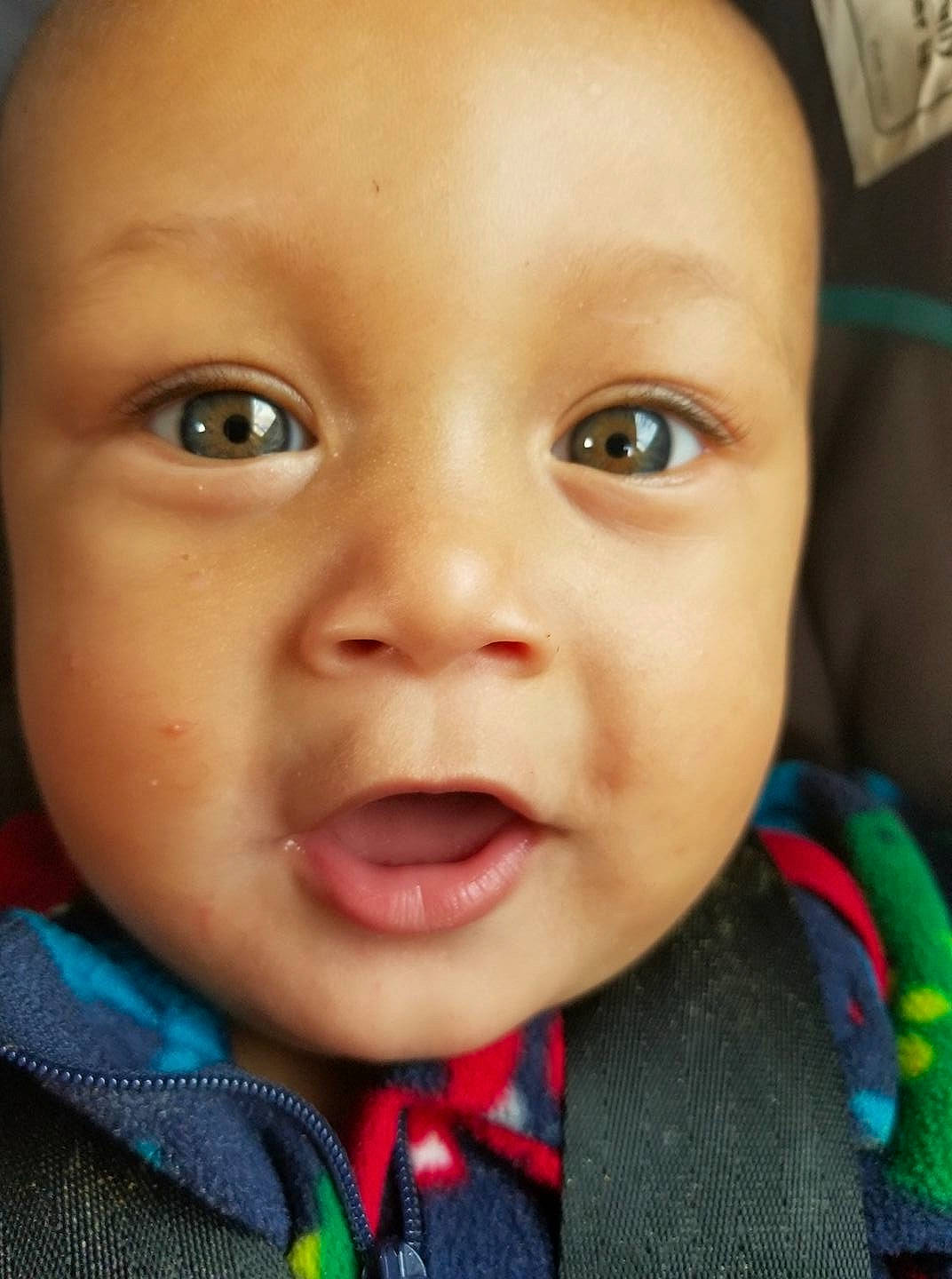 Brian is registered to the contest to win money with this photo: baby, cheek, child, chin, close_up, eye, eyebrow, face, facial_expression, forehead, head, iris, lip, mouth, nose, organ, person, skin, smile, toddler