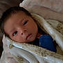 Santiago is registered to the contest to win money with this photo: newborn, baby, blanket, wrapped, face, infant, soft, cozy, closeup, portrait, child, skin, hand, warm, sleepy, cute, toddler, young, cuddle, resting