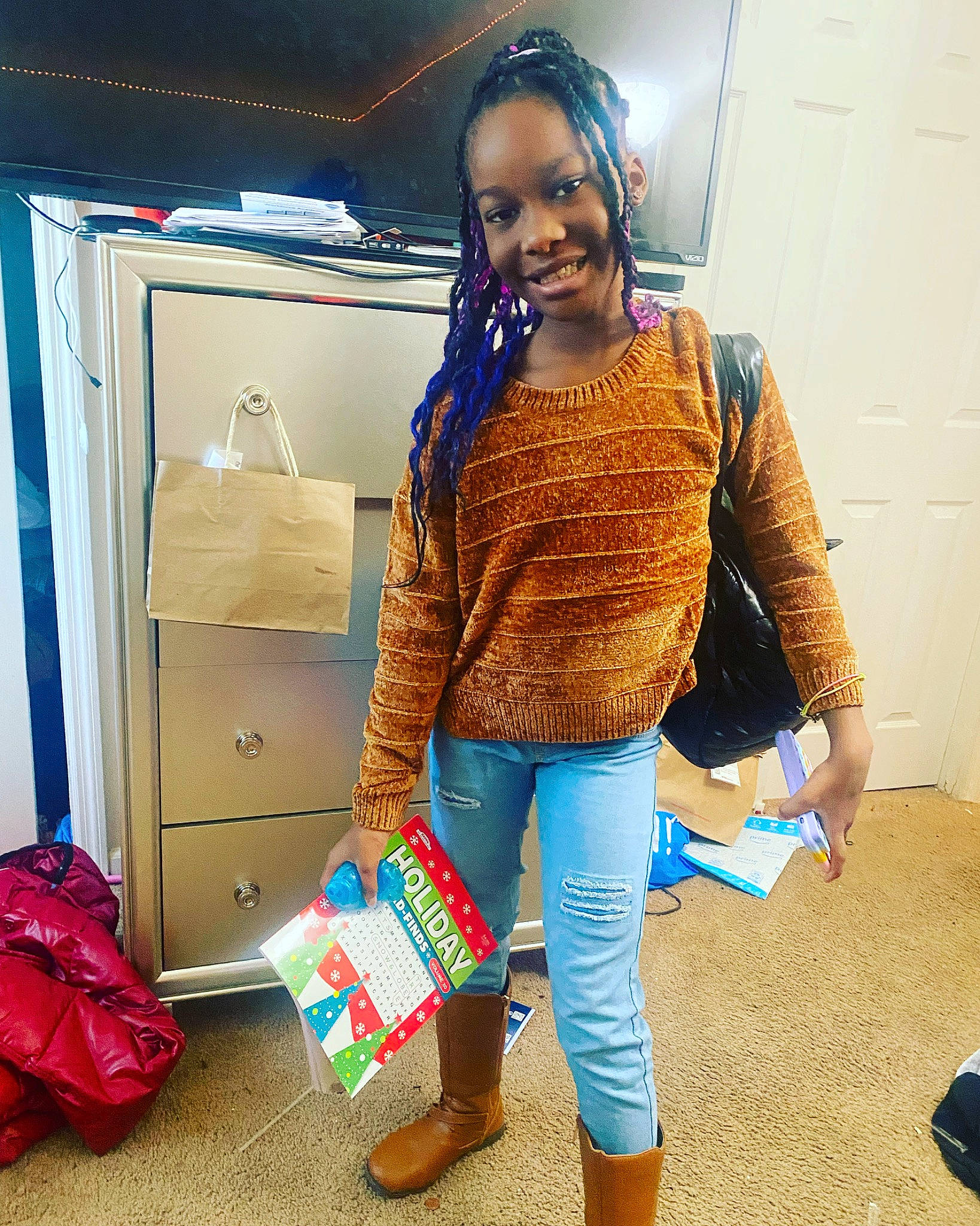 Azariah is registered to the contest to win money with this photo: bag, electric_blue, eyewear, fashion_accessory, fashion_design, flooring, fun, human_leg, jewellery, joy, knee, luggage_and_bags, pattern, person, shipping_box, sleeve, sportswear, standing, thigh, travel