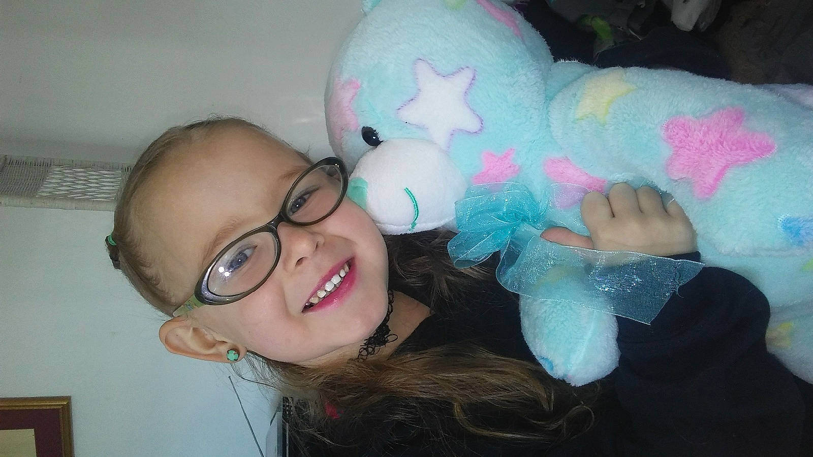 Starrlynn is registered to the contest to win money with this photo: ear, eye, eyewear, face, fun, girl, glasses, head, joy, nose, person, pink, product, skin, smile, textile, vision_care