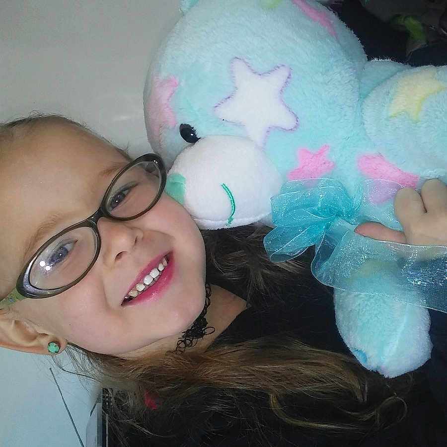 Starrlynn is registered to the contest to win money with this photo: ear, eye, eyewear, face, fun, girl, glasses, head, joy, nose, person, pink, product, skin, smile, textile, vision_care