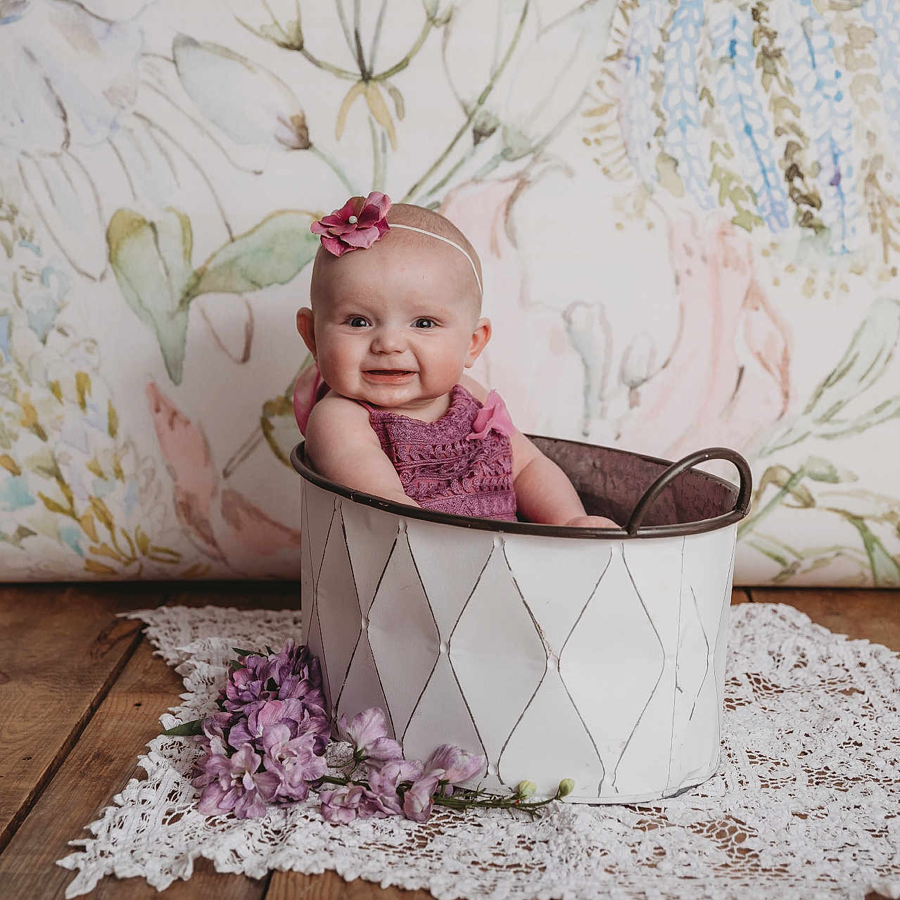 Blakeley is registered to the contest to win money with this photo: animal, baby, basket, canine, crib, face, flower, furniture, happy, hardwood, head, infantbed, newborn, pattern, person, photography, plant, portrait, sitting, wood