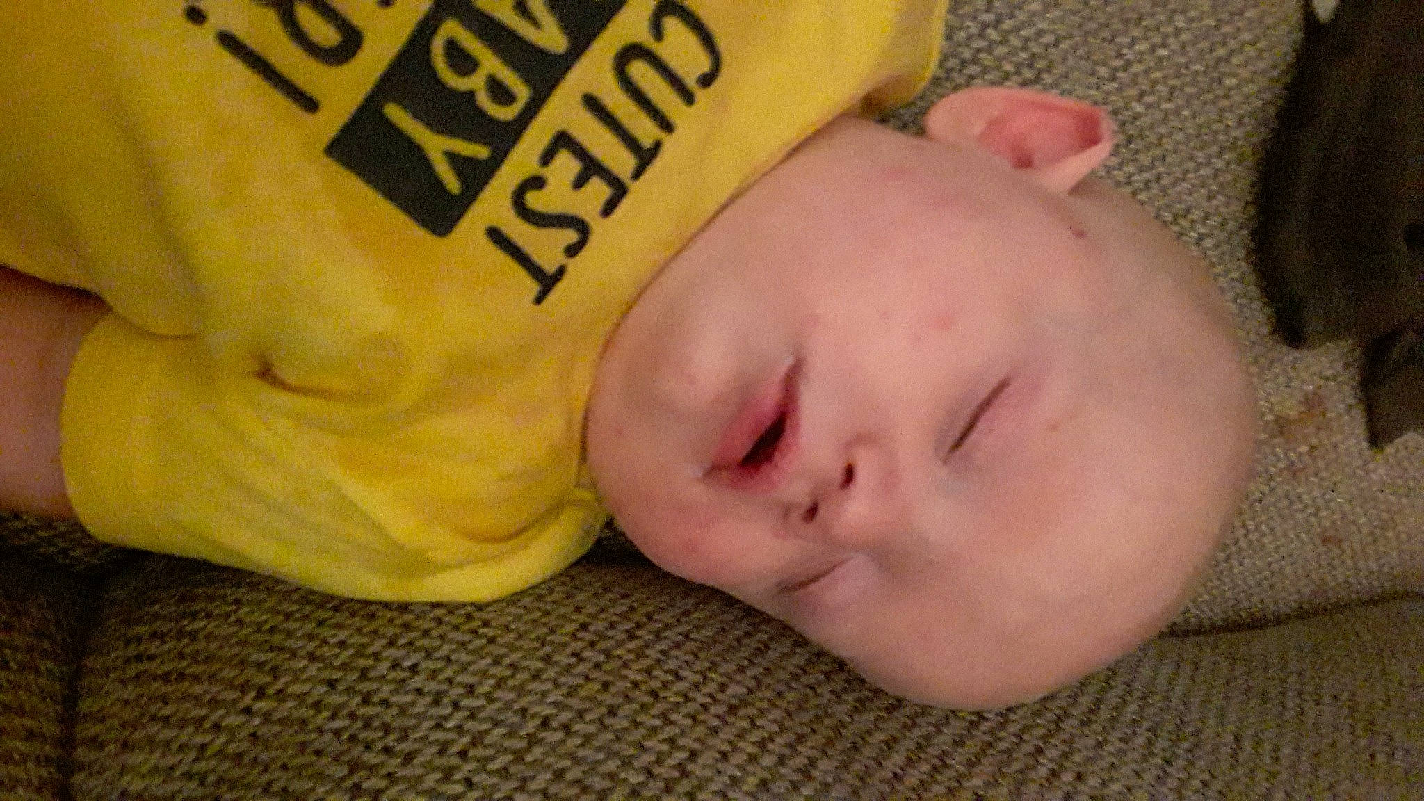 Kristopher is registered to the contest to win money with this photo: baby, baby_products, baby_sleeping, baby_toddler_clothing, bedtime, cheek, child, comfort, ear, eyelash, font, linens, nap, neck, nose, person, room, skin, sleep, sleeve