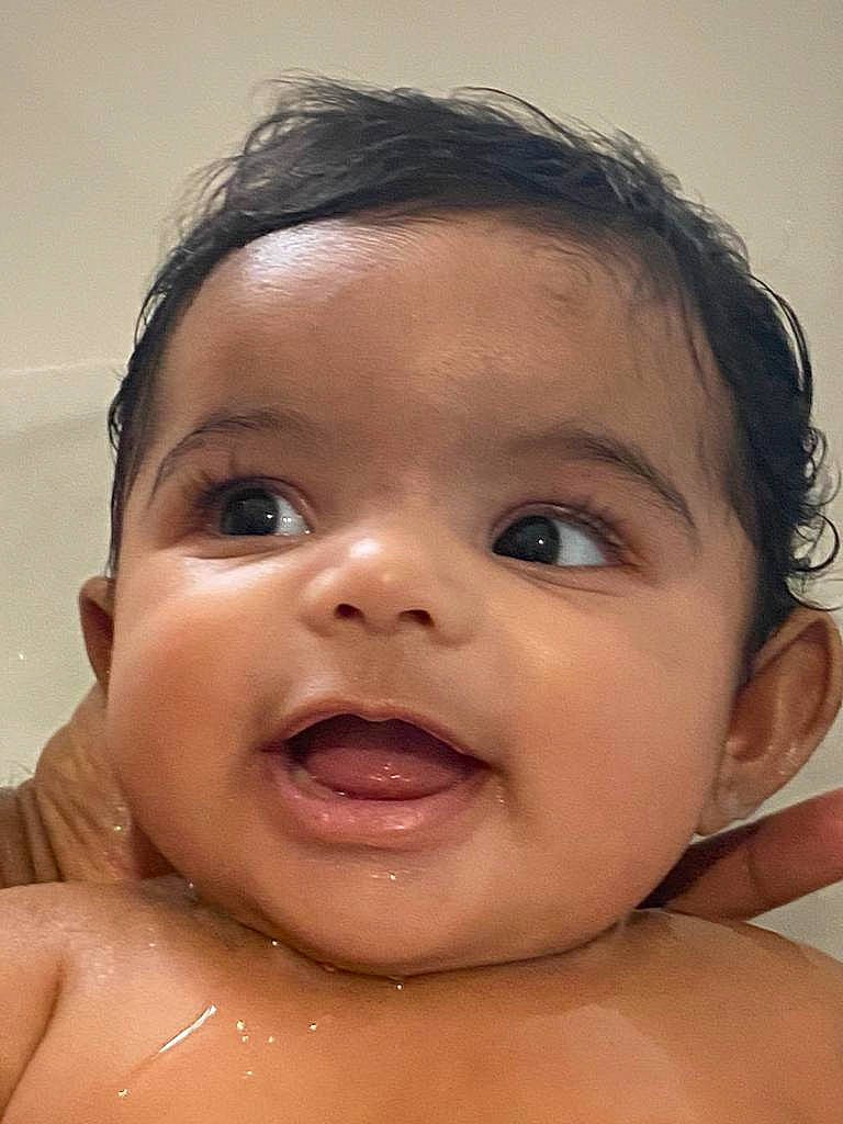 Lara joined the competition — help win amazing prizes! baby, baby_making_funny_faces, bathing, cheek, child, chin, close_up, ear, eyebrow, face, facial_expression, forehead, head, lip, mouth, neck, nose, person, skin, smile