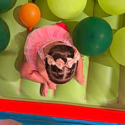 Analiz joined the competition — help win amazing prizes! child, tutu, balloons, pink_bows, hair, floor_mat, colorful, indoor, play_area, sitting, top_view, baby, cute, party, decorations, pastel_colors, childrens_play, soft_surface, footwear, person