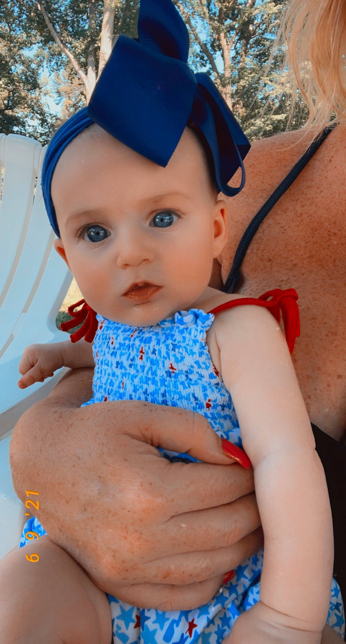 Ava is registered to the contest to win money with this photo: azure, baby, baby_toddler_clothing, blue, cap, child, cool, eye, finger, fun, hand, happy, headgear, headwear, organ, people, person, pink, skin, summer