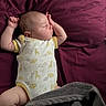 baby, sleeping, onesie, bed, blanket, infant, child, cute, animal_print, soft, peaceful, resting, indoors, pale_skin, short_hair, raised_arms, fabric, comfort, portrait, toddler