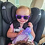 accessories, baby, bodypart, bottle, car, car_interior, cushion, face, finger, glasses, hand, head, homedecor, person, photography, portrait, purple, sunglasses, transportation, vehicle