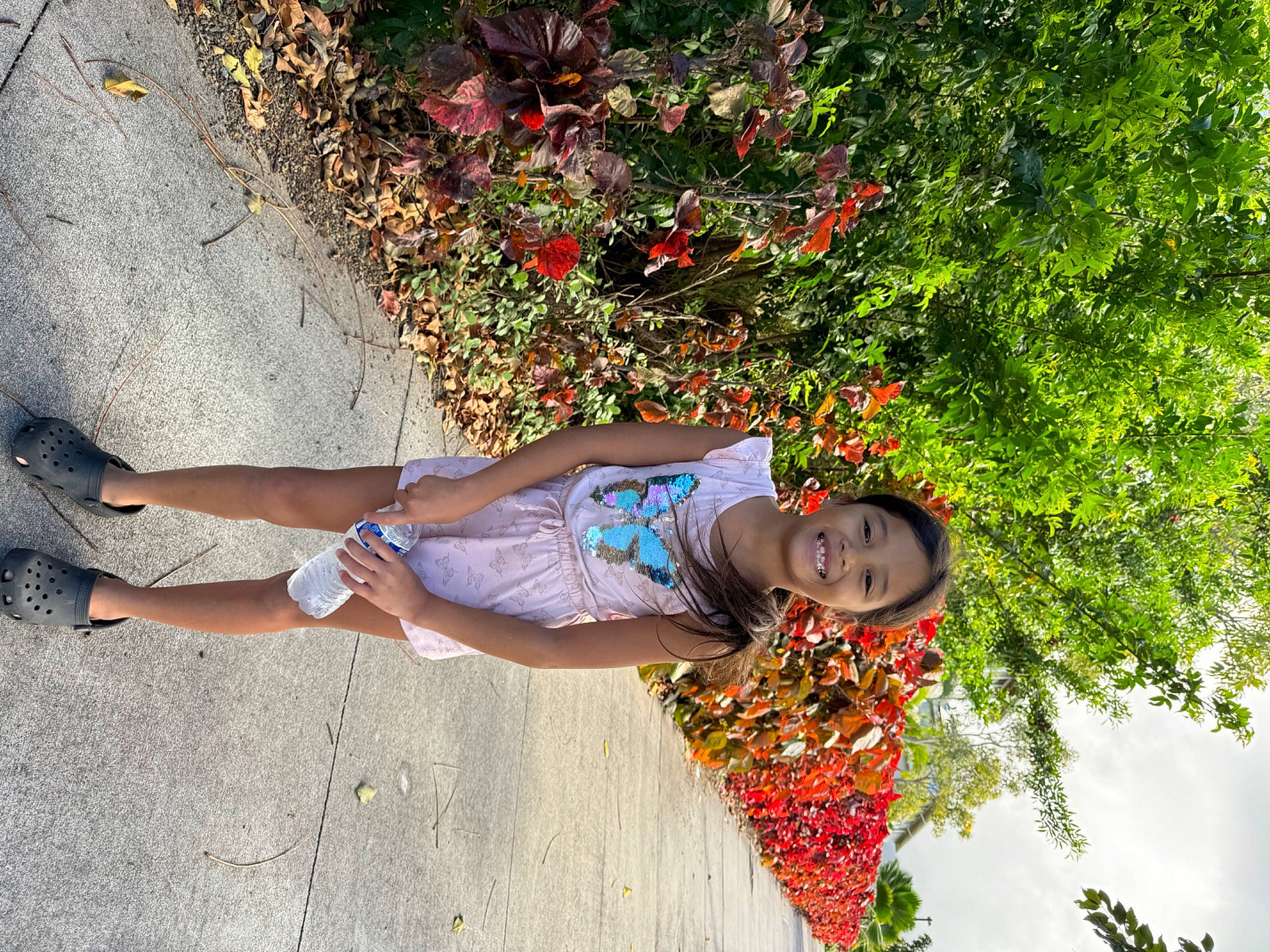 Santali-ann joined the competition — help win amazing prizes! electric_blue, eyewear, floral_design, flower, fun, grass, happy, human_leg, joy, landscape, leisure, orange, people_in_nature, person, plant, recreation, shadow, shrub, sidewalk, sitting