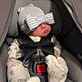 Autumn is registered to the contest to win money with this photo: baby, car_seat, hat, striped_hat, bow, pajamas, infant, sleeping, child, cute, cozy, blanket, newborn, seatbelt, clothing, indoors, person, resting, soft, adorable
