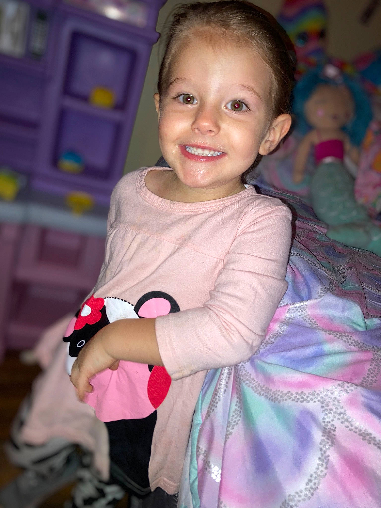 Kimberly is registered to the contest to win money with this photo: arm, baby_toddler_clothing, cheek, child, dress, eye, face, fun, hairstyle, happy, head, iris, joy, magenta, organ, person, pink, purple, skin, sleeve