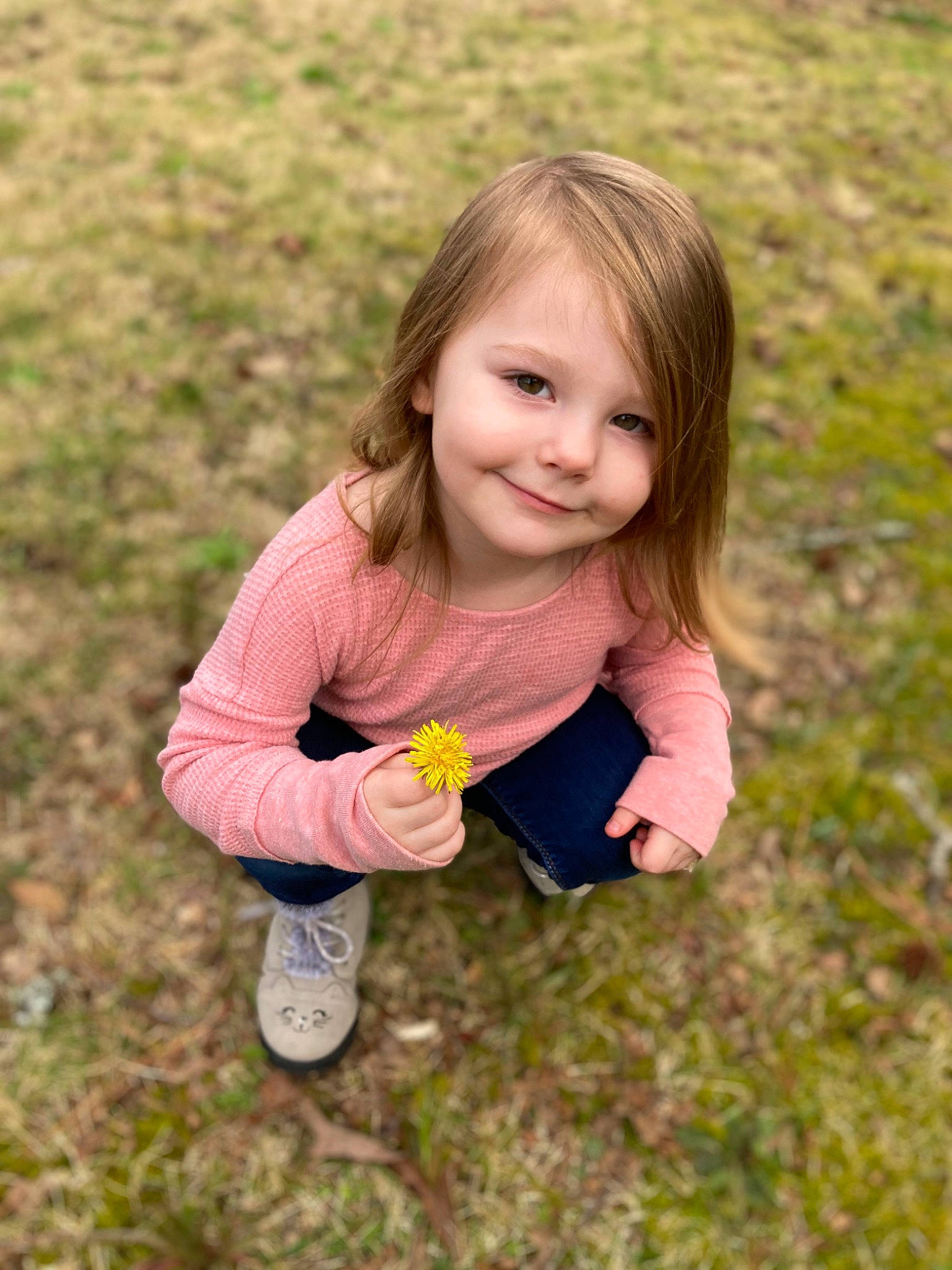 Kimberly joined the competition — help win amazing prizes! baby_toddler_clothing, blond, brown_hair, child, face, fun, grass, grass_family, grassland, happy, joy, leaf, meadow, people_in_nature, person, plant, prairie, sitting, smile, soil