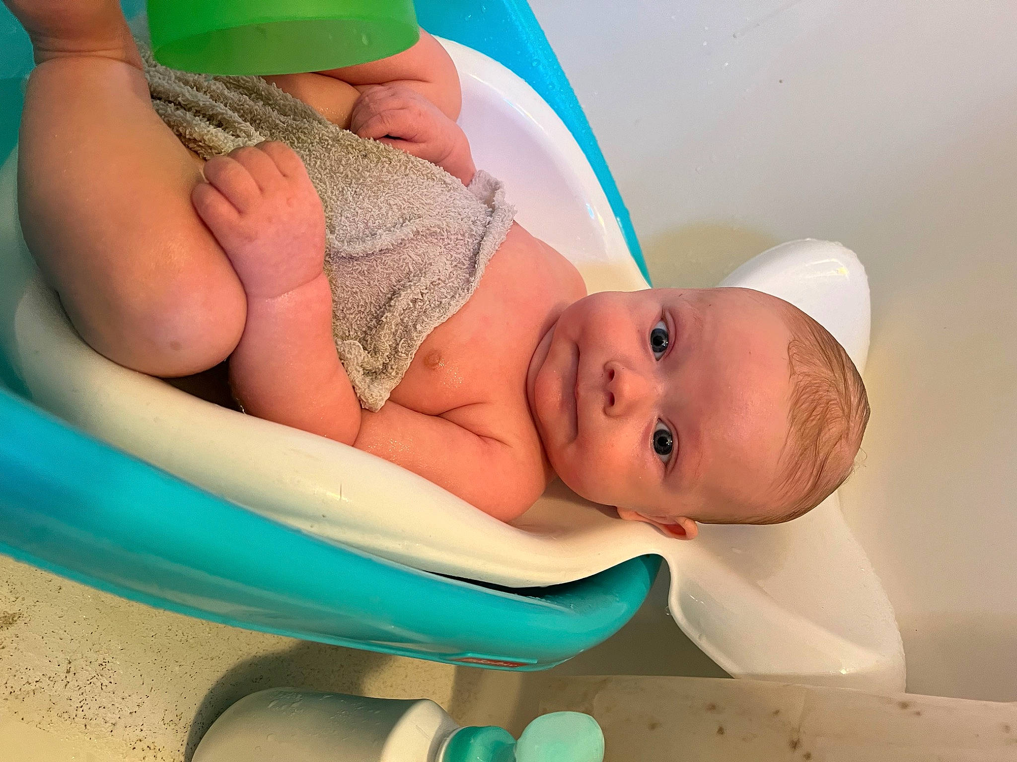 Raiden is registered to the contest to win money with this photo: abdomen, aqua, baby, baby_products, baby_safety, blue, chest, child, comfort, face, finger, green, hat, headgear, mouth, person, product, skin, stomach, thigh