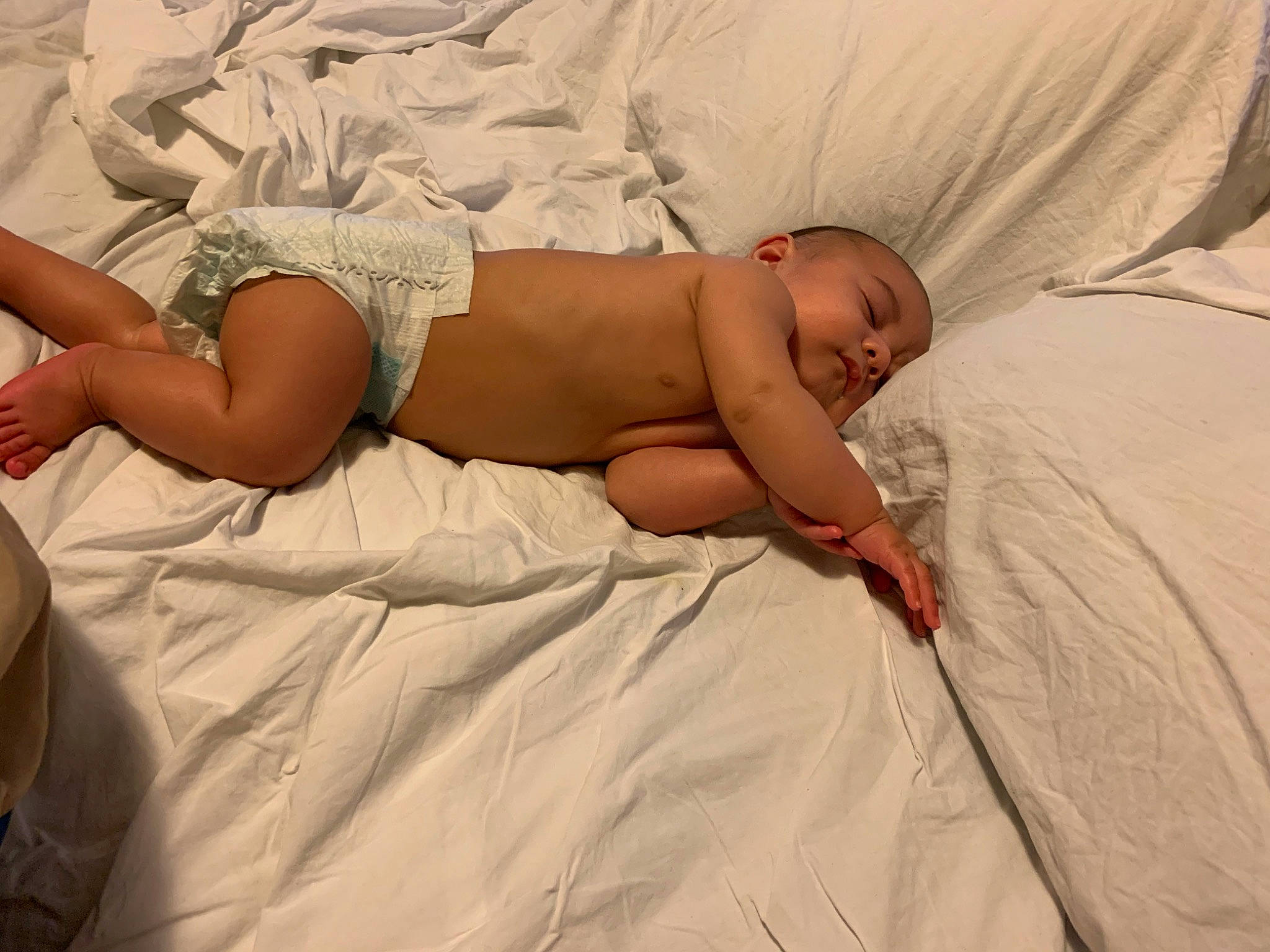 Maceo is registered to the contest to win money with this photo: baby, child, comfort, flesh, headwear, leg, muscle, person, sleep