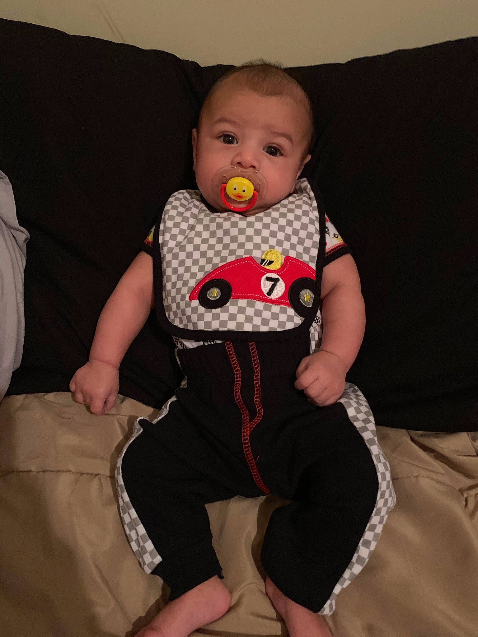 Maceo is registered to the contest to win money with this photo: baby, baby_products, baby_toddler_clothing, cheek, child, furniture, person, pink, product, sitting, skin, textile, toddler