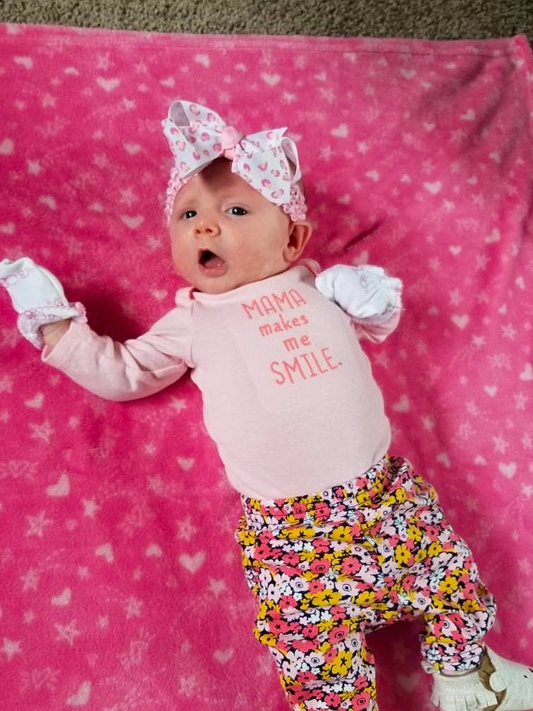 Angelique is registered to the contest to win money with this photo: baby, baby_products, baby_toddler_clothing, child, design, pattern, person, pink, product, sleeve, toddler