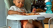 Julian joined the competition — help win amazing prizes! toddler, high_chair, spaghetti, messy, food, eating, indoor, kitchen, child, sippy_cup, face, hands, floor, tile_floor, curtains, fan, furniture, window, door, clothing