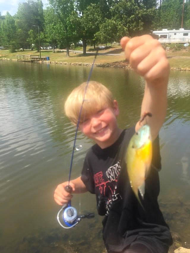 Ayven is registered to the contest to win money with this photo: angling, boats_and_boating_equipment_and_supplies, finger, fish, fisherman, fun, grass, hand, joy, lake, leisure, mammal, outdoor_recreation, person, personal_protective_equipment, recreation, smile, thumb, tree, vertebrate