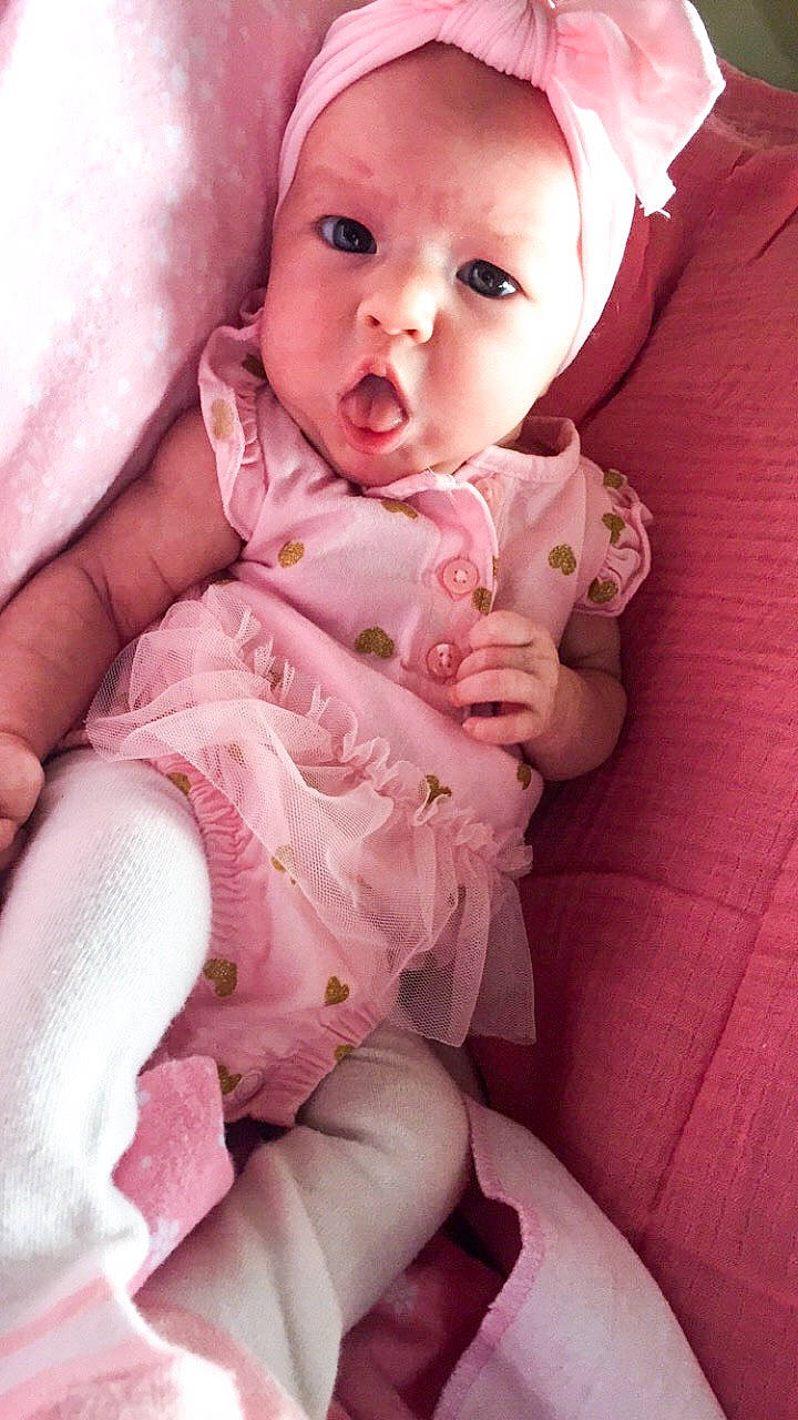 Flora joined the competition — help win amazing prizes! baby, cheek, child, mouth, nose, person, pink, skin, smile, toddler