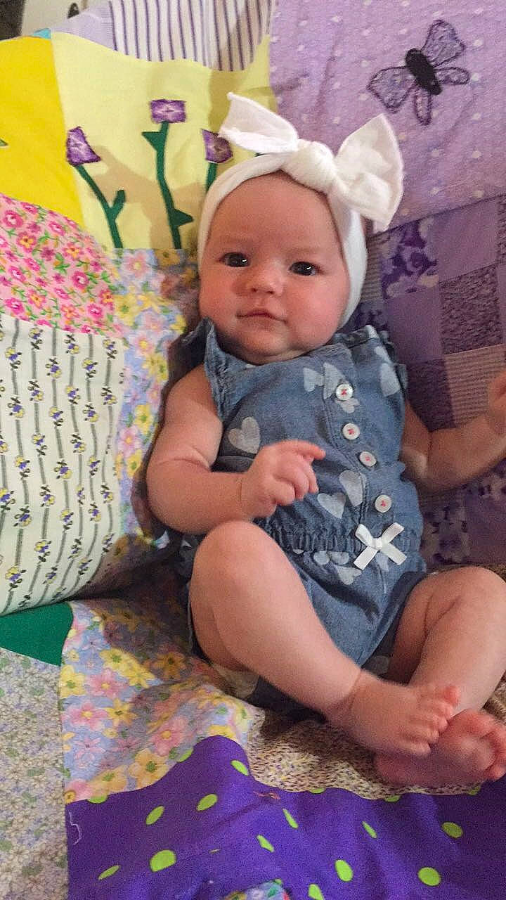 Flora joined the competition — help win amazing prizes! baby, baby_products, baby_toddler_clothing, child, ear, fawn, pattern, person, pink, product, purple, textile, toddler