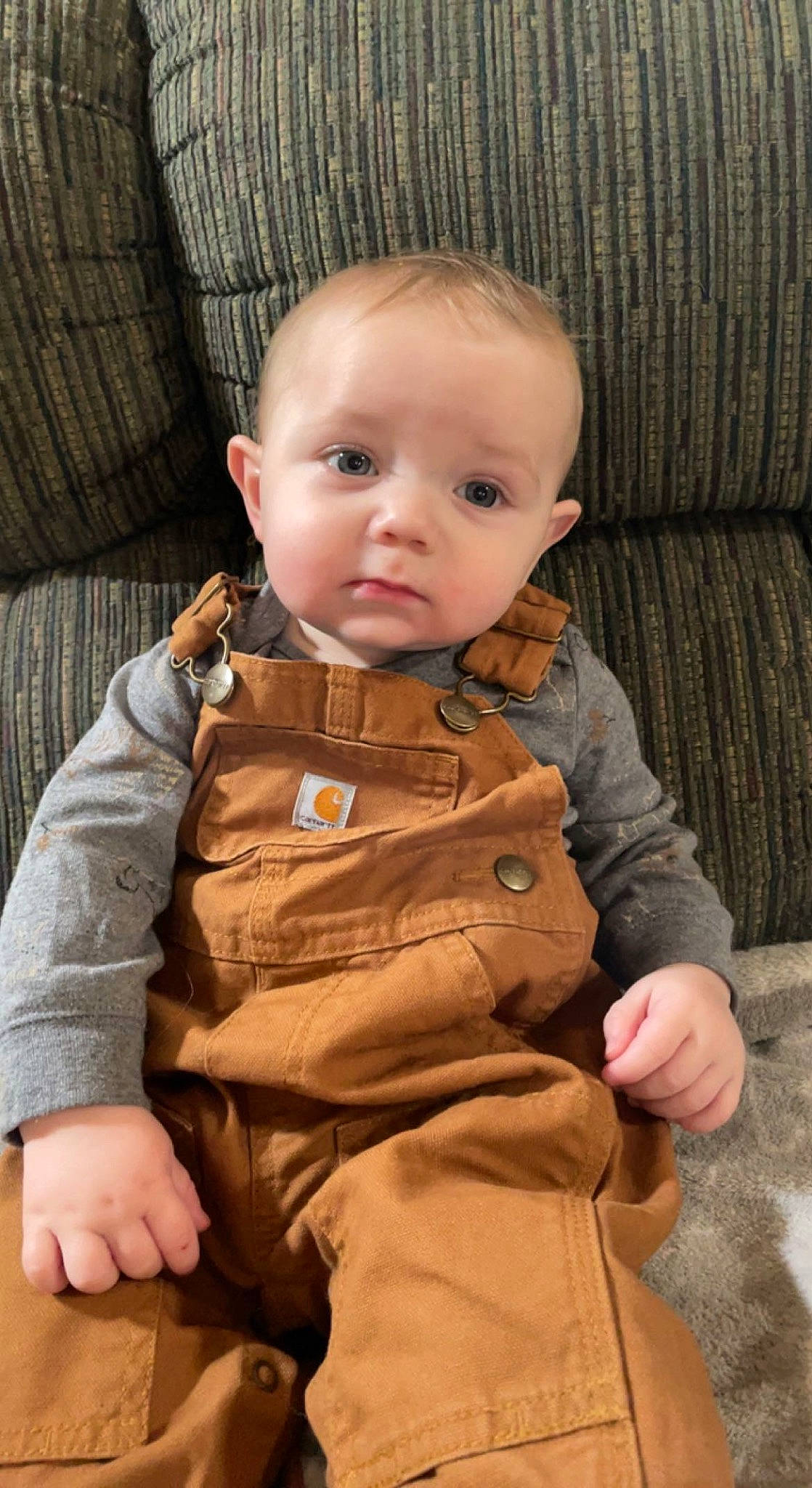 Brantley is registered to the contest to win money with this photo: baby, baby_toddler_clothing, cheek, child, collar, comfort, eye, face, hairstyle, head, human_body, iris, jacket, nose, outerwear, person, skin, sleeve, textile, toddler