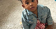 Aubree is registered to the contest to win money with this photo: toddler, child, baby, denim_jacket, pigtails, red_ribbons, curly_hair, carpet, indoor, toy, checkered_dress, cute, sitting, face, portrait, expression, earrings, furniture, playtime, curiosity