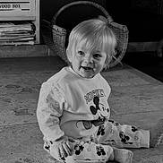 Maylo participe au concours pour gagner de l'argent avec cette photo : basket, child, clothing, cozy, cute, face, floor, furniture, hair, home, indoor, mickey_mouse, monochrome, portrait, sitting, smile, socks, tile, toddler, wood_box