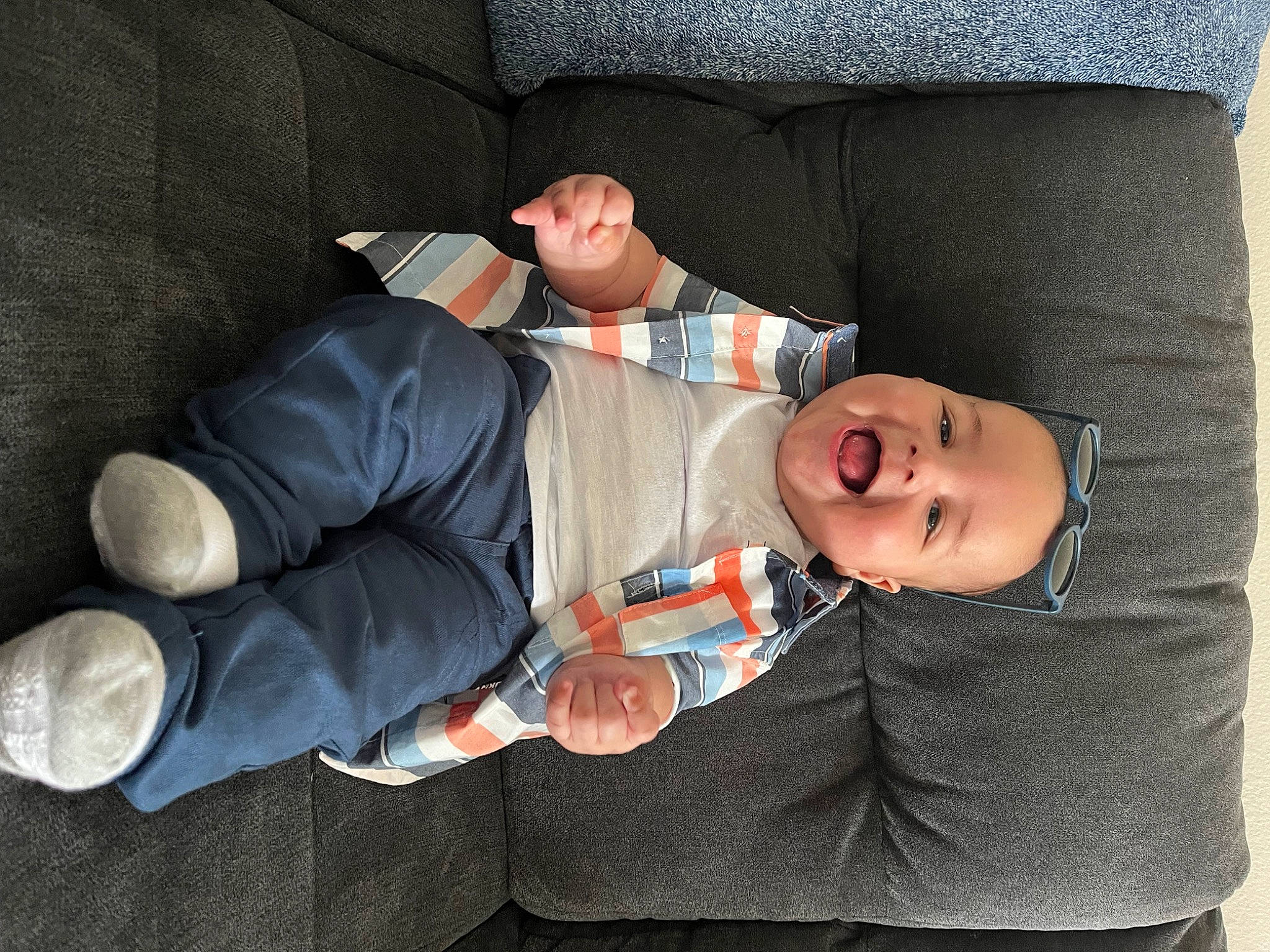 Arthur joined the competition — help win amazing prizes! arm, child, clothing, comfort, couch, eyewear, finger, fun, gesture, hand, human_body, human_leg, joint, knee, lap, leg, mouth, person, product, sitting