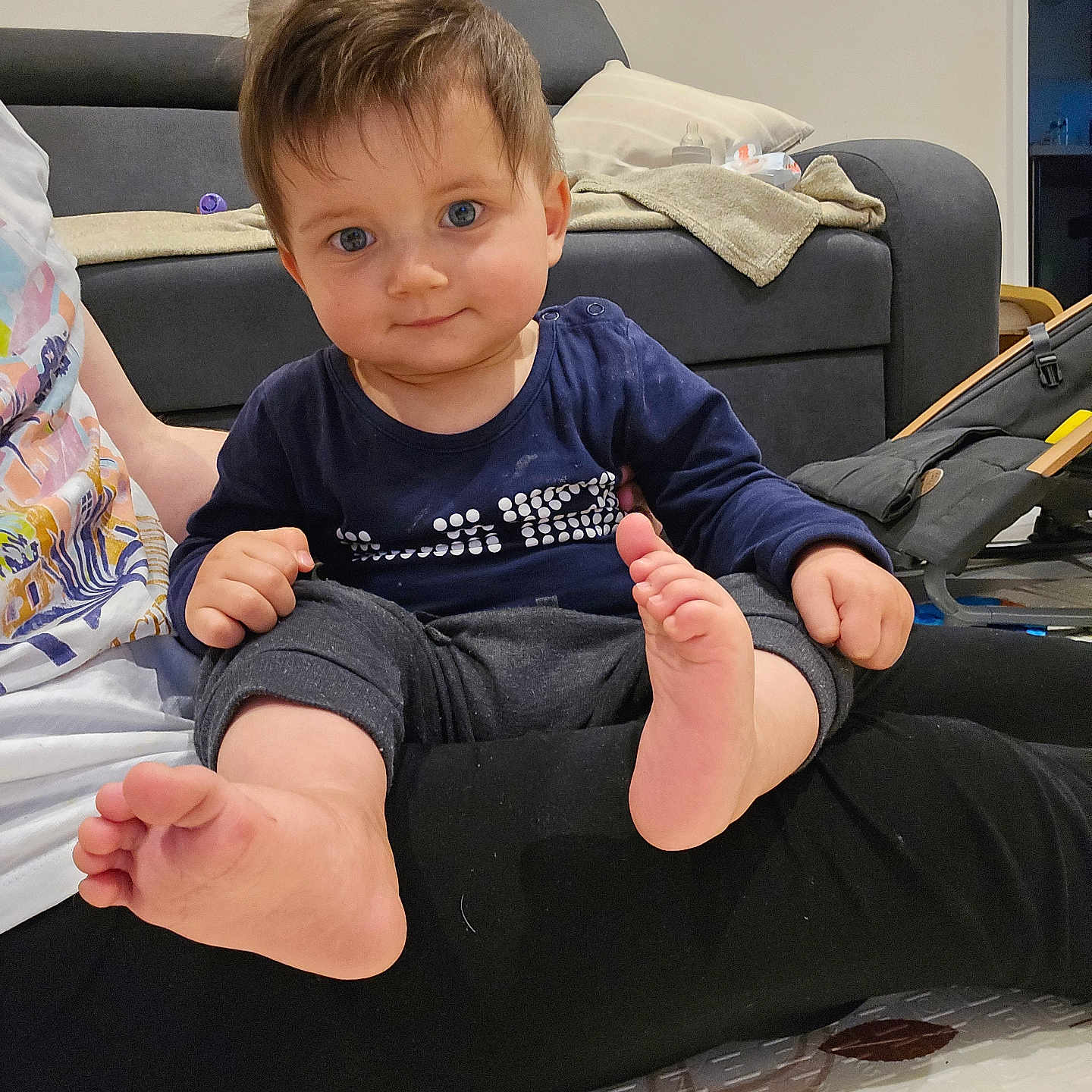 Theodorr is registered to the contest to win money with this photo: architecture, baby, bodypart, building, clothing, couch, cushion, face, finger, furniture, hand, head, homedecor, indoors, pants, person, photography, portrait, sitting, t_shirt