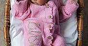 Naomi joined the competition — help win amazing prizes! baby, basket, bow, child, cozy, cute, headband, indoors, infant, knitted_clothing, newborn, peaceful, pink, portrait, resting, sleeping, small_hands, soft_lighting, wearing, white_cushion