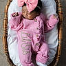 Naomi joined the competition — help win amazing prizes! newborn, baby, sleeping, pink, bow, knitted_clothing, basket, white_cushion, infant, cute, peaceful, indoors, portrait, soft_lighting, cozy, child, small_hands, headband, resting, wearing