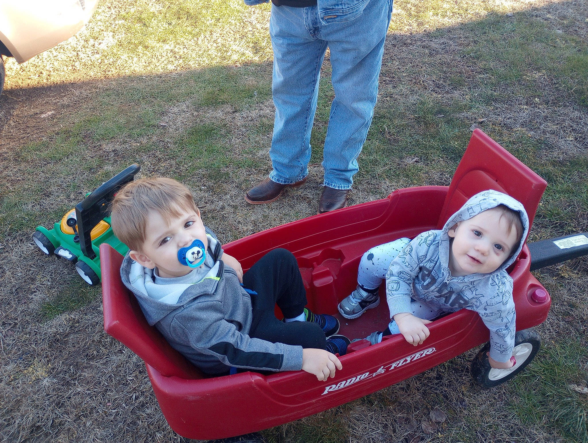 Michael is registered to the contest to win money with this photo: baby, baby_carriage, baby_products, baby_toddler_clothing, child, comfort, fun, grass, green, joy, lap, lawn, leisure, person, photograph, plant, recreation, sitting, smile, toddler