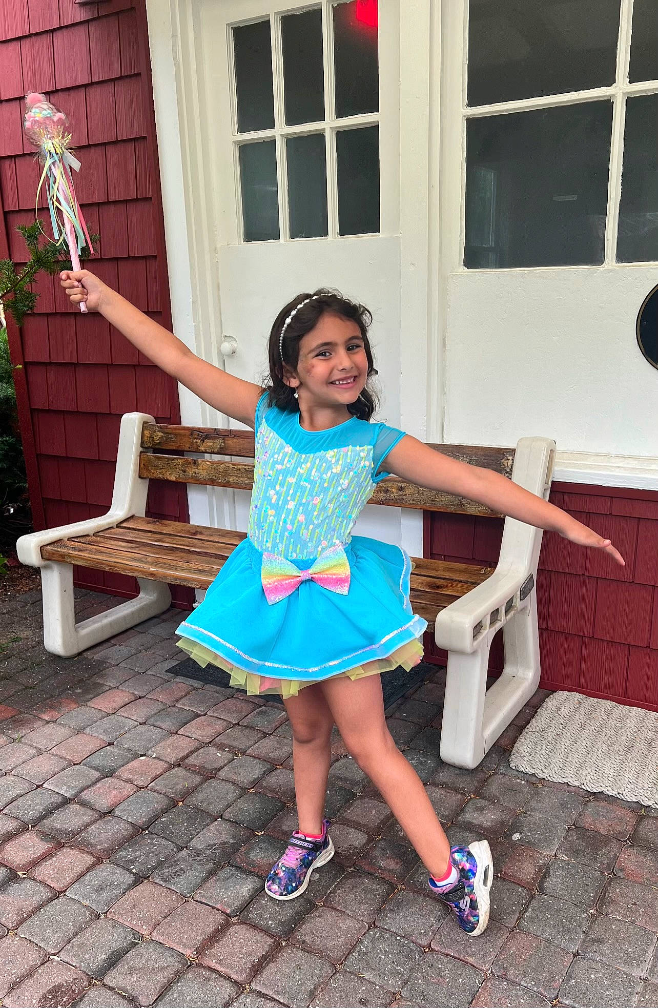 Valentina is registered to the contest to win money with this photo: child, electric_blue, flooring, foot, fun, happy, human_leg, joy, leisure, magenta, person, pink, plant, play, sandal, sitting, smile, standing, summer, thigh