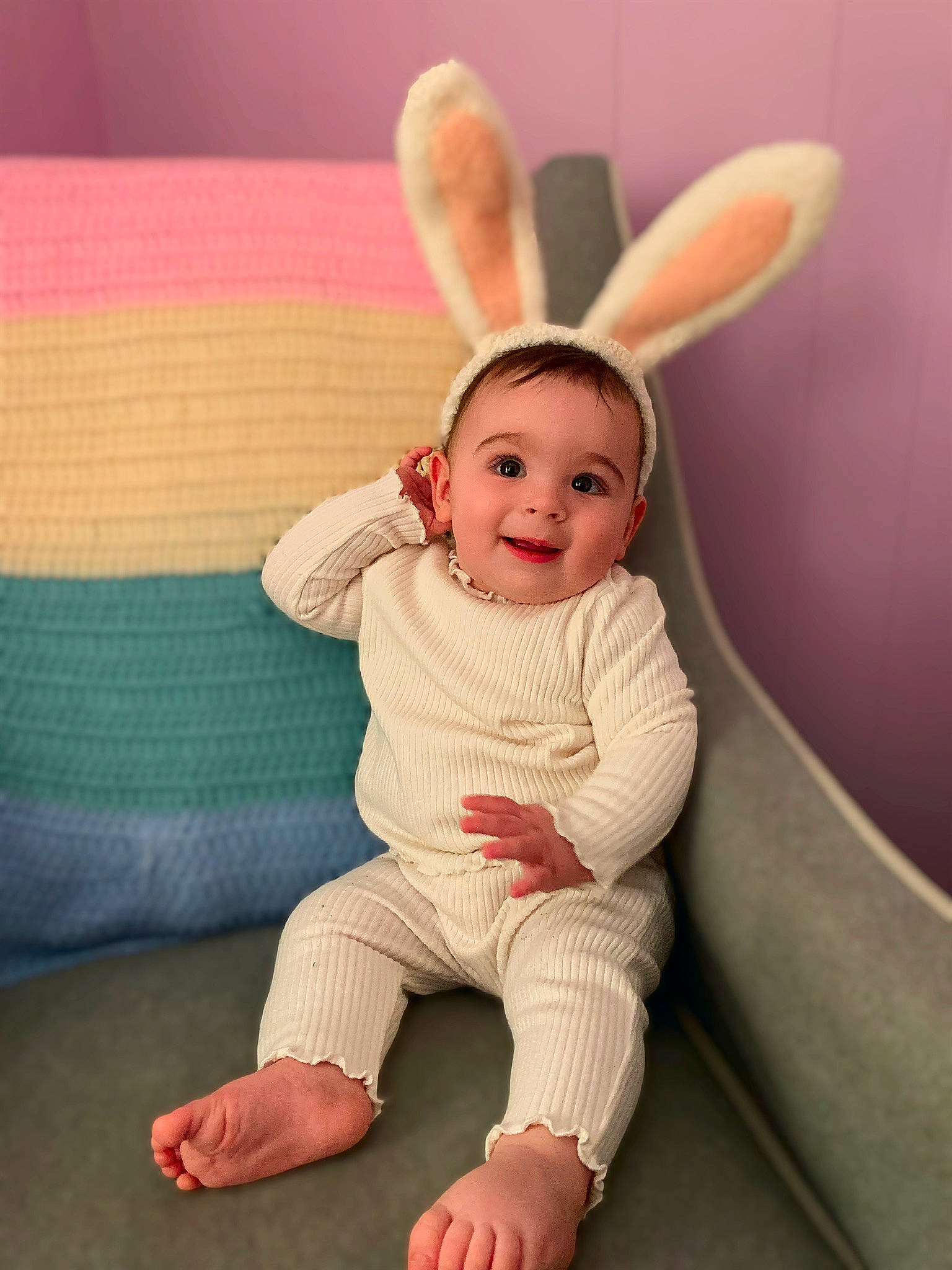 Eloise is registered to the contest to win money with this photo: arm, baby, baby_toddler_clothing, comfort, face, finger, flash_photography, fun, gesture, happy, head, human_body, joy, orange, organ, person, pink, skin, sleeve, smile