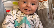 Ryley joined the competition — help win amazing prizes! baby, baby_chair, baby_garment, bird, cartoon_animals, child, clothing, cute, elephant, face, happy, indoor, infant, monkey, onesie, portrait, rainbow, shark, smile, toddler