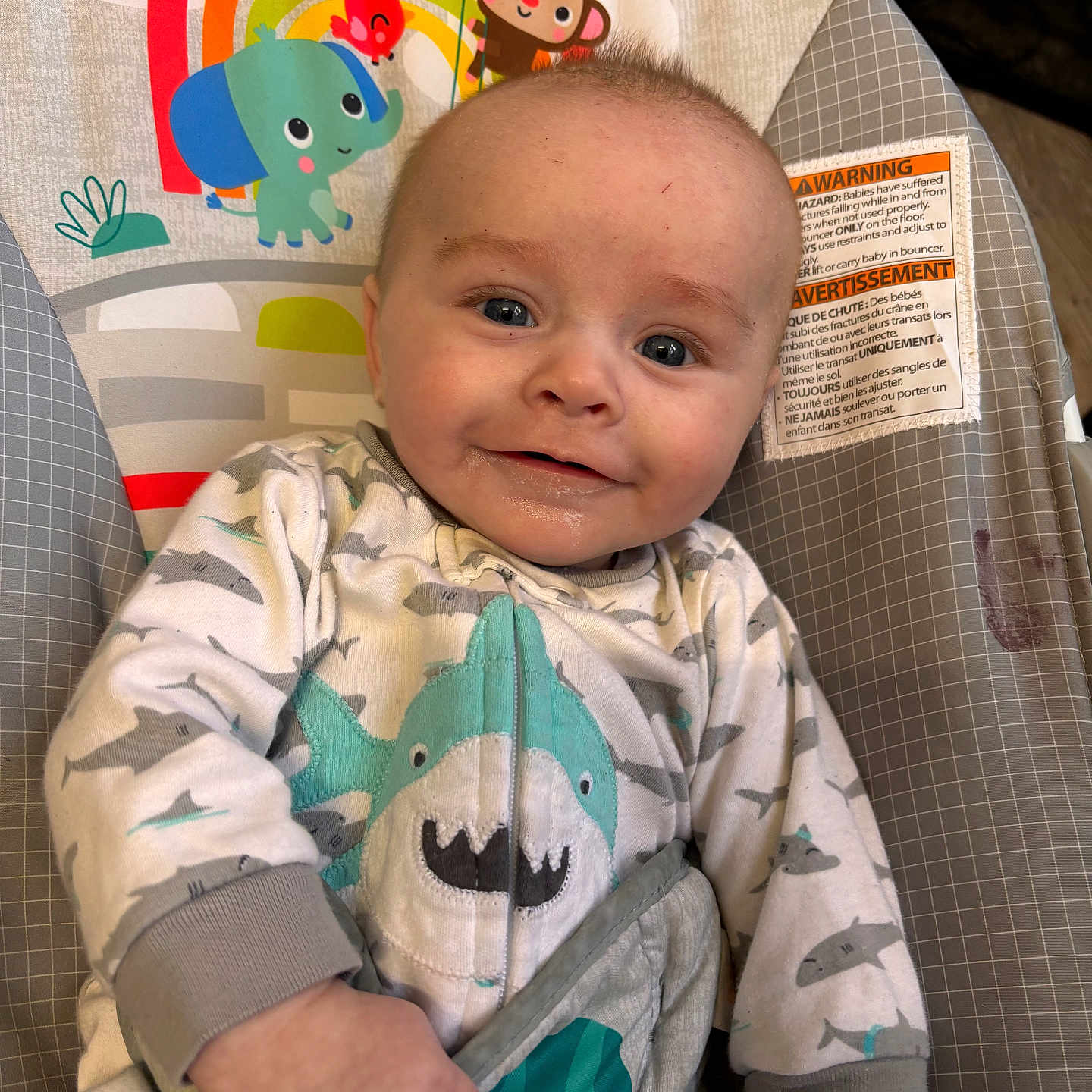 Ryley joined the competition — help win amazing prizes! baby, child, smile, onesie, shark, baby_chair, cartoon_animals, elephant, monkey, bird, rainbow, clothing, infant, cute, happy, portrait, indoor, face, baby_garment, toddler