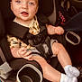Bentley joined the competition — help win amazing prizes! baby, car_seat, child, blue_eyes, smile, socks, seat_belt, clothing, infant, safety, cute, happy, indoor, person, seat, car_interior, head, face, arm, leg