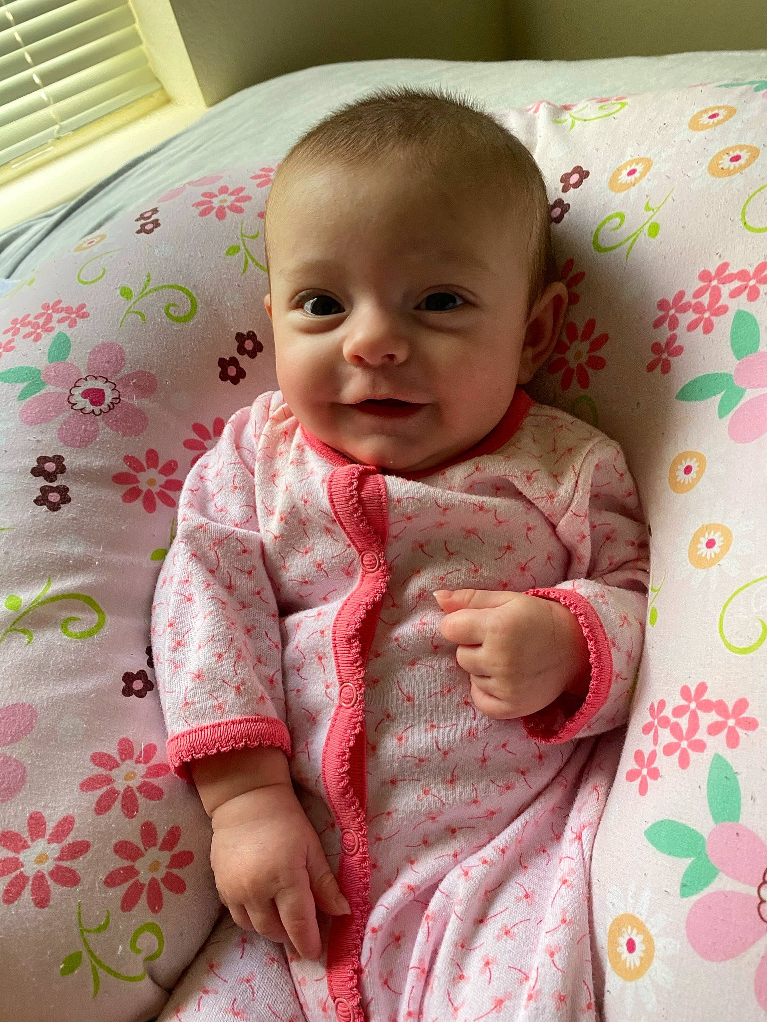 Annabeth is registered to the contest to win money with this photo: baby, baby_toddler_clothing, beauty, cheek, child, comfort, dress, eye, face, happy, joy, linens, lip, pattern, person, pink, sitting, skin, sleeve, smile