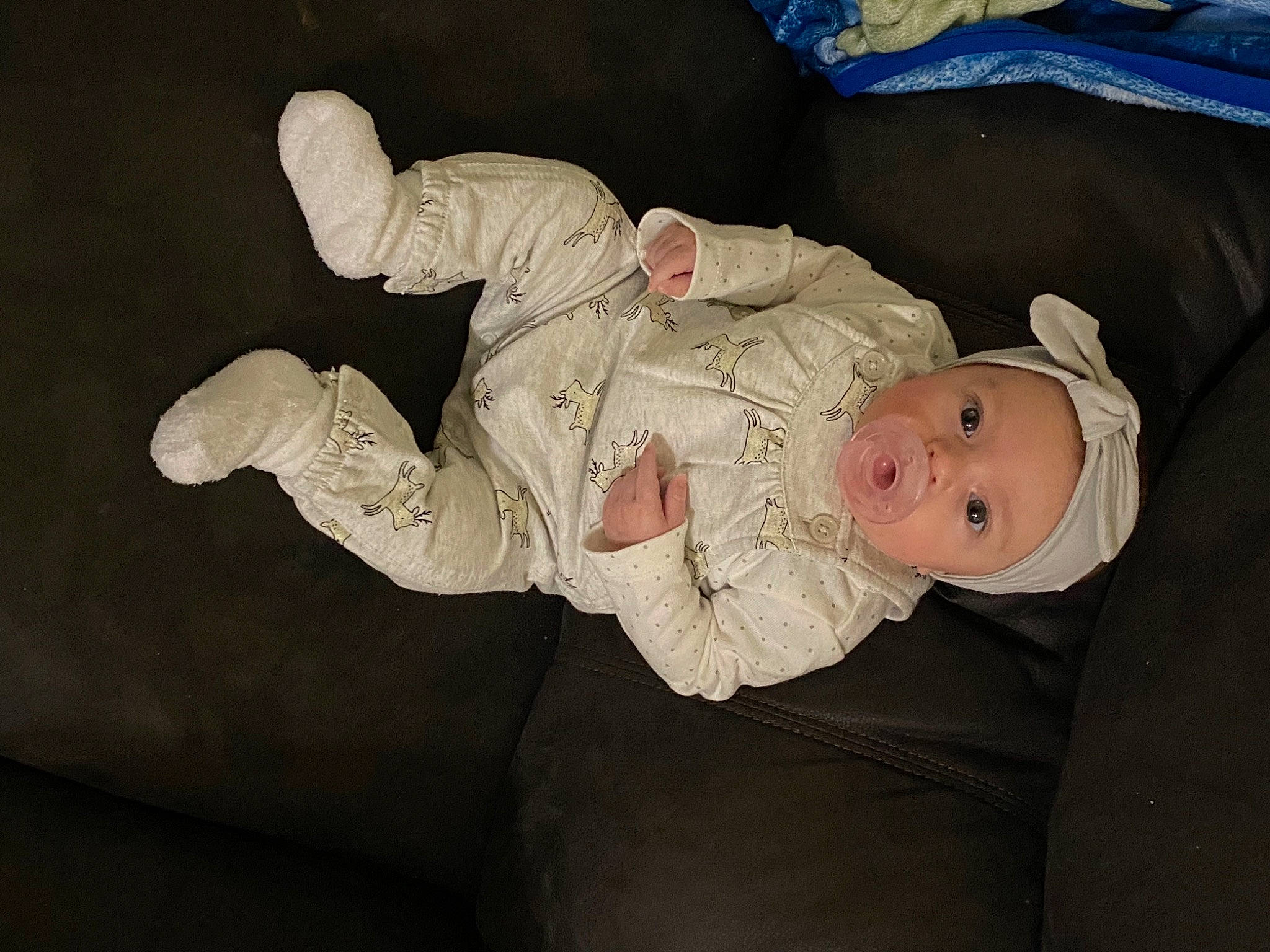 Annabeth joined the competition — help win amazing prizes! baby, baby_products, baby_safety, baby_toddler_clothing, child, comfort, head, headwear, human_body, linens, person, room, sitting, sleeve, smile, suit, toddler