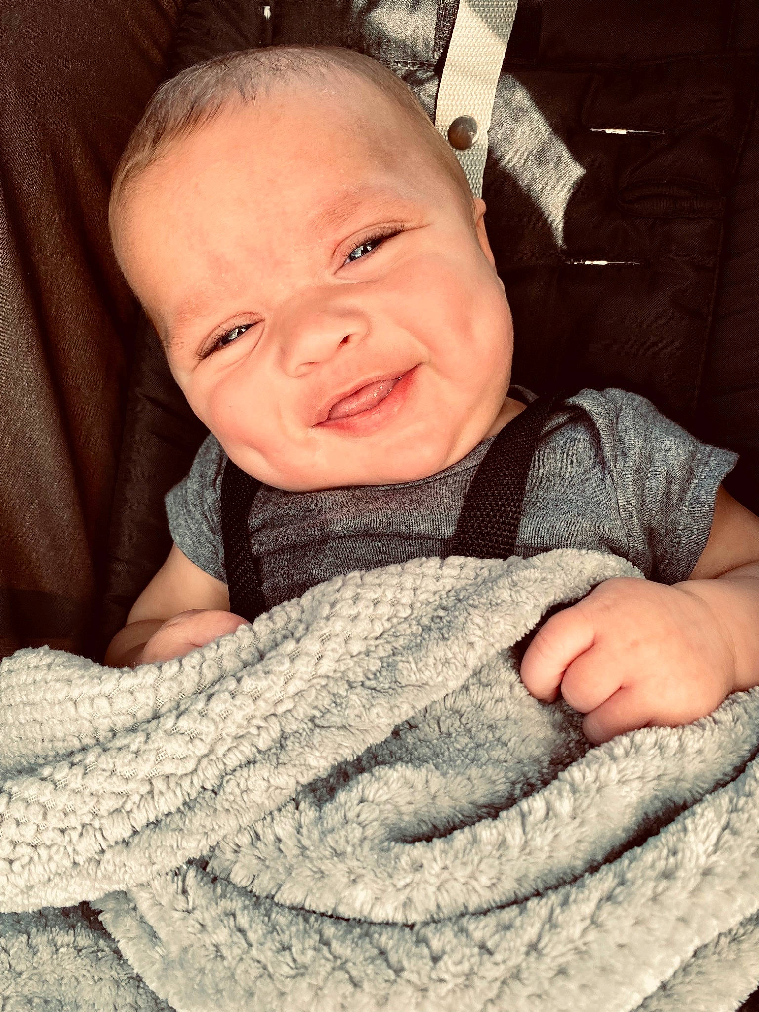 Kashtin joined the competition — help win amazing prizes! baby, baby_toddler_clothing, cheek, child, comfort, finger, gesture, grey, happy, linens, nose, outerwear, person, skin, sleeve, smile, textile, thumb, toddler, white