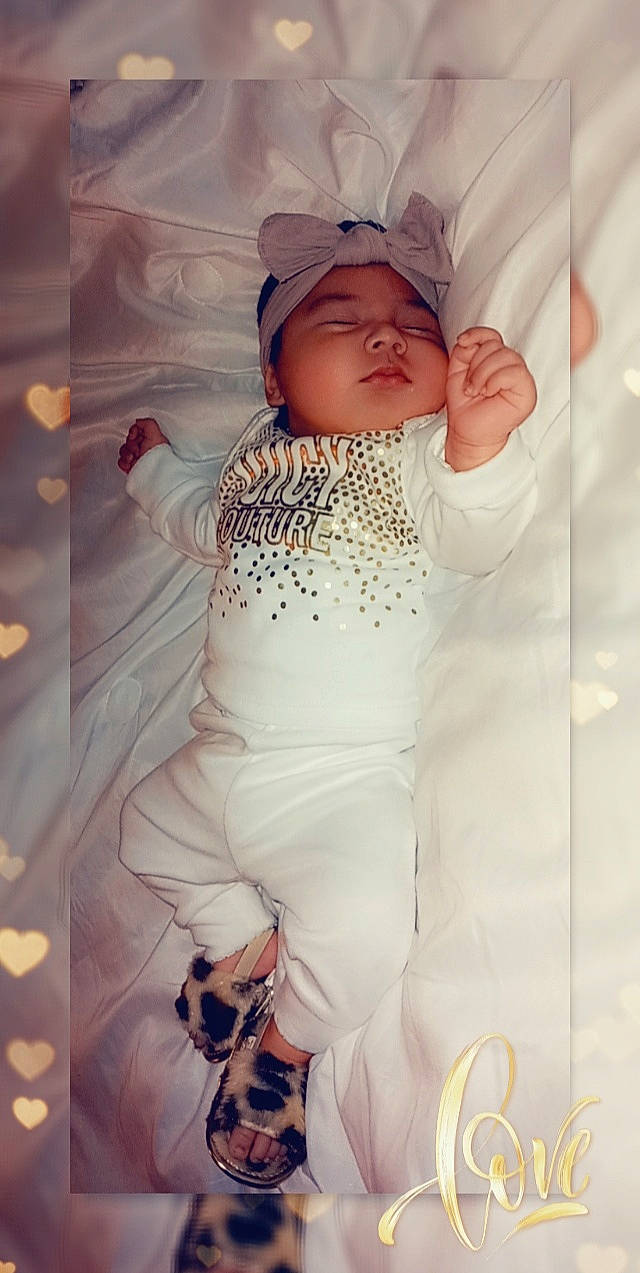 Sunny is registered to the contest to win money with this photo: baby, child, headwear, person, photography, smile, toddler, white