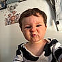 Alezio participe au concours pour gagner de l'argent avec cette photo : toddler, child, face, expression, scrunched_face, black_and_white_shirt, indoor, wall_art, animal_pictures, clothing, hanger, baby, portrait, person, cute, funny_expression, home, room, young_child, casual