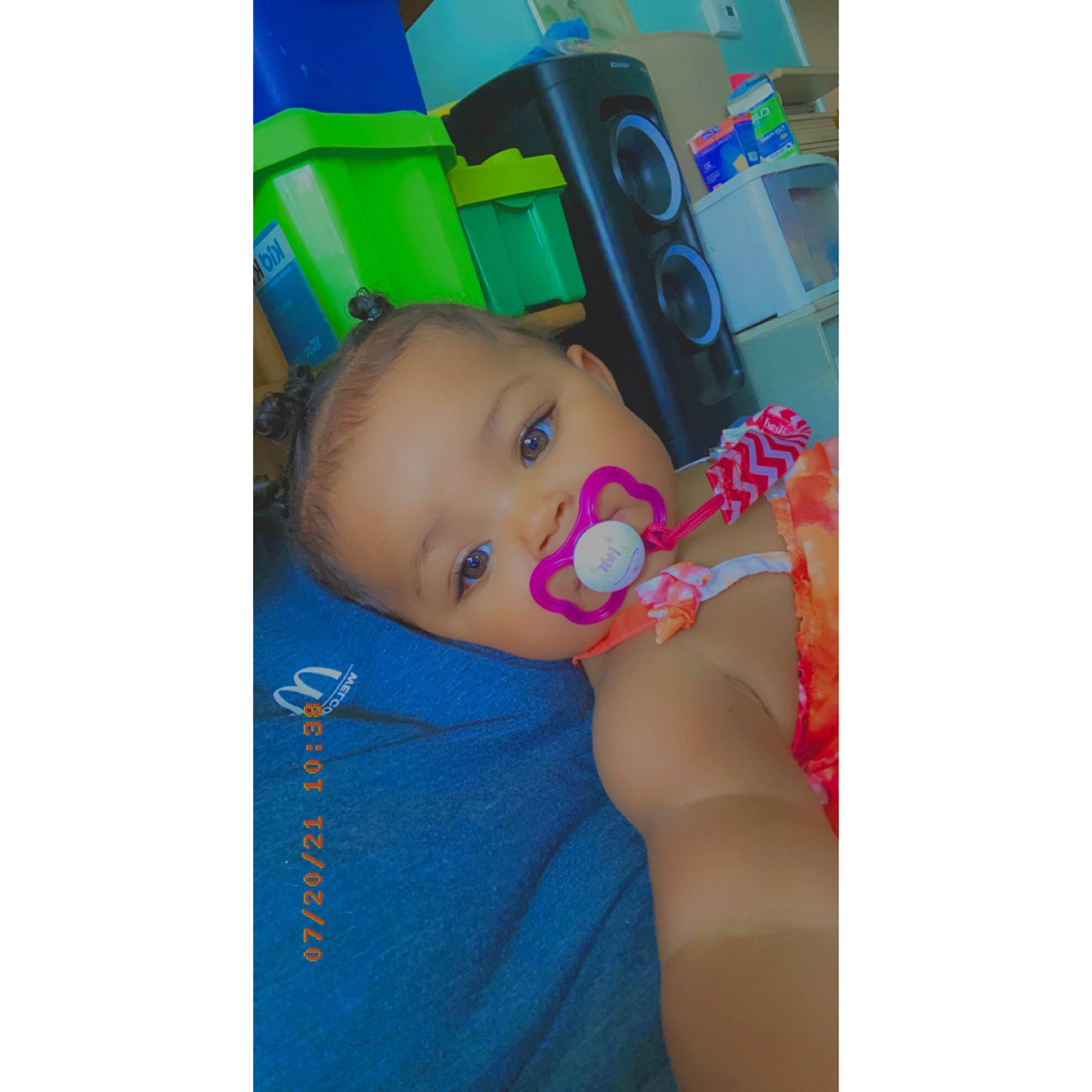 Kaylani is registered to the contest to win money with this photo: art, baby, baby_products, baby_toddler_clothing, child, electric_blue, eyelash, face, fashion_accessory, font, head, human_body, iris, magenta, nose, pattern, person, shirt, sleeve, t_shirt