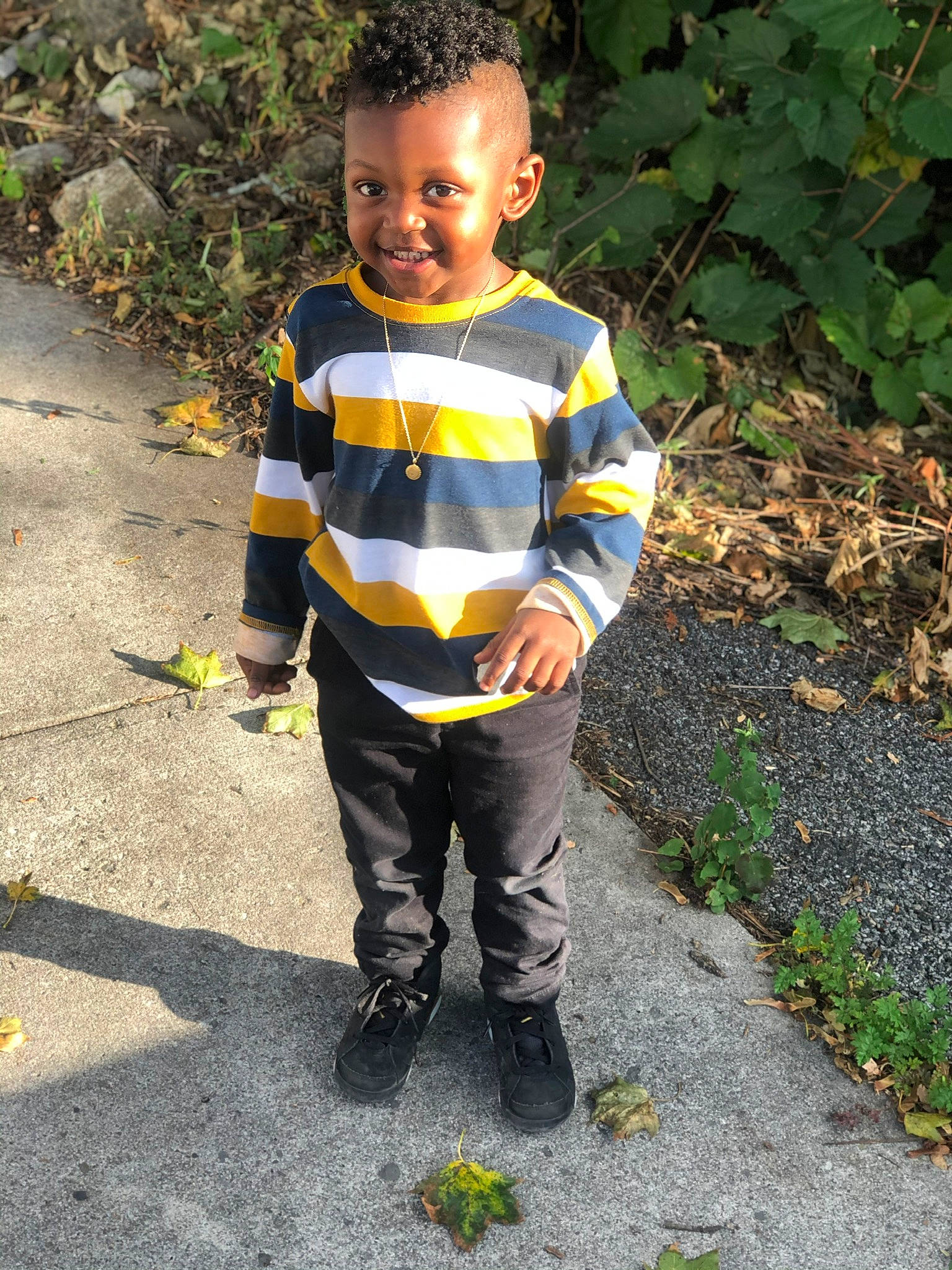 Juelz joined the competition — help win amazing prizes! asphalt, baby_toddler_clothing, child, eye, grass, happy, joy, leaf, pattern, people_in_nature, person, personal_protective_equipment, plant, road_surface, shoe, sleeve, smile, sneakers, soil, t_shirt