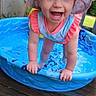 Ila Mae is registered to the contest to win money with this photo: baby, clothing, costume, crawling, dress, face, happy, hat, head, outdoors, person, photography, plant, pool, portrait, pottedplant, summer, sunhat, swimwear, water