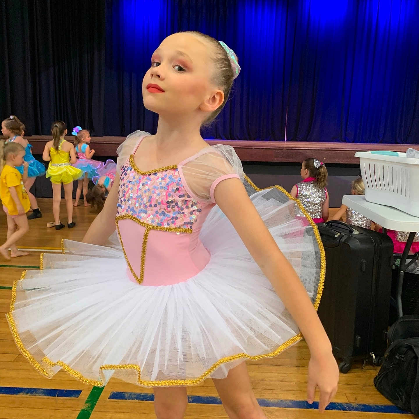 Lettie is registered to the contest to win money with this photo: accessories, architecture, bag, ballerina, ballet, building, child, clothing, costume, dancepose, dancing, dress, electricaldevice, eveningdress, face, female, footwear, formalwear, girl, hall