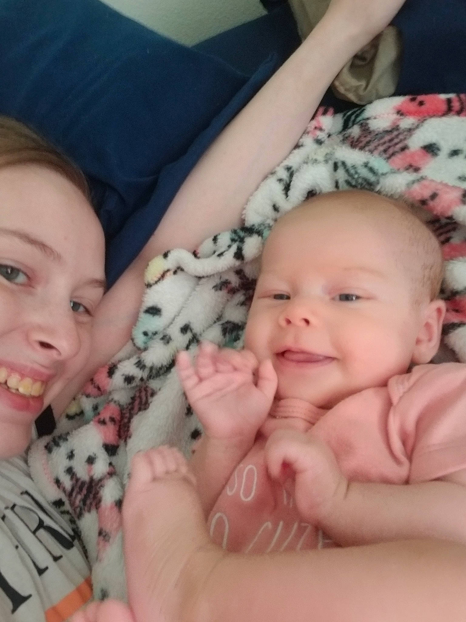 Maryjane is registered to the contest to win money with this photo: baby, cheek, child, electronic_device, eye, face, finger, fun, hand, head, human, iris, joy, leg, lip, mouth, muscle, nose, person, photography