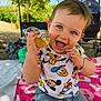 toddler, child, smiling, blue_eyes, shorts, tshirt, mickey_mouse, donald_duck, pluto, outdoor, picnic, bottle, drink, grass, trees, stroller, sunlight, happy, playing, summer